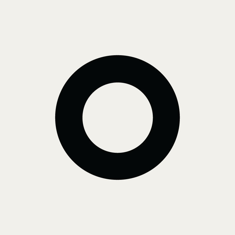 Circular newspaper ring in matt black powder coated aluminium
