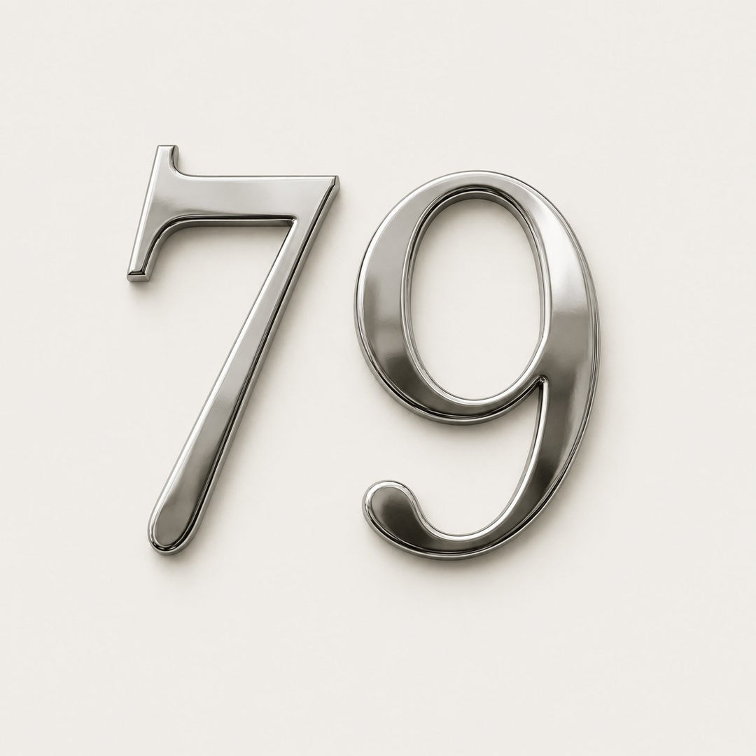 316 stainless steel door numbers in brushed and polished finishes on an apartment door